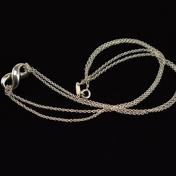 TIFFANY & CO: Sterling Silver "Infinity" Necklace - Picture 6 of 6